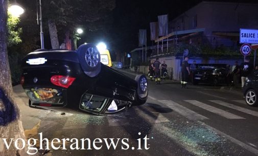 SALICE TERME 14/06/2017: Carambola in via Diviani. Auto perde il controllo e si ribalta. Salvi gli avventori del vicino Pub